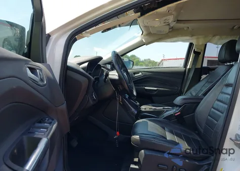 2016 Ford Escape Titanium z USA, uszkodzony, nr VIN 1FMCU0JX4GUA43736